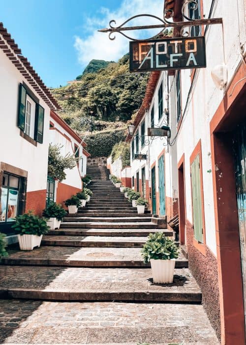 The quaint and colourful streets of Sao Vicente with a mountain backdrop, Madeira, Portugal