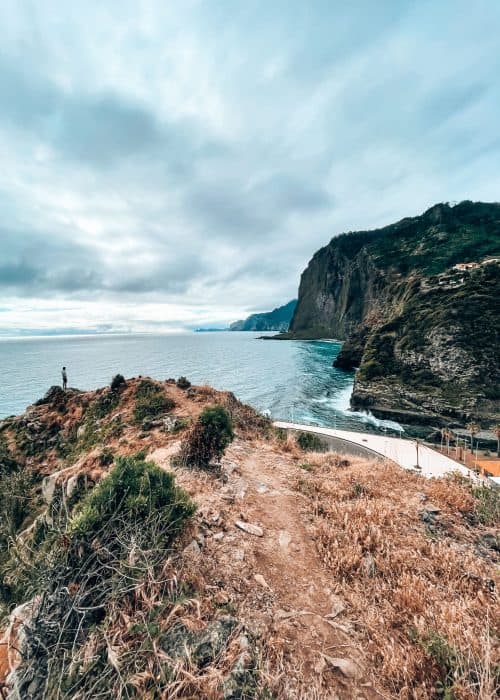 Andy stood overlooking the steep sloping cliffs on the north coast of Madeira at Miradouro do Guindaste, Portugal