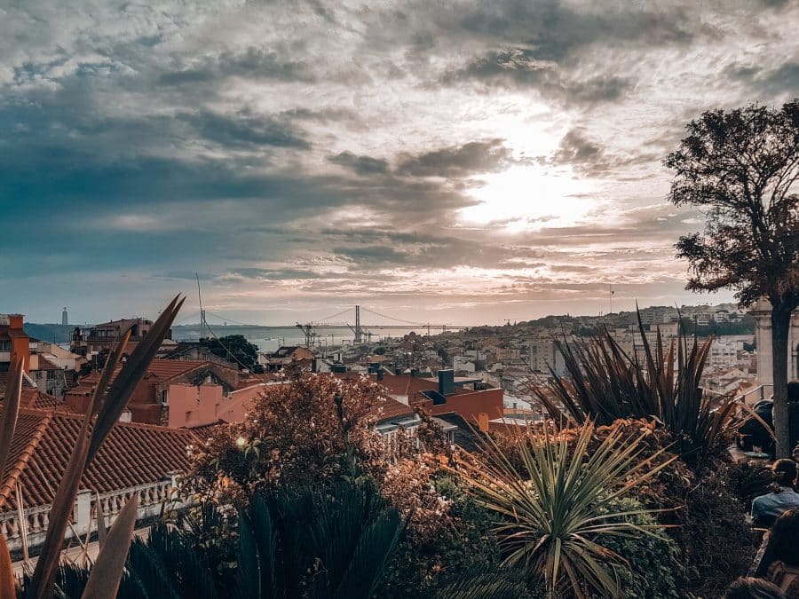 View from the rooftop of Park Bar over white-washed buildings and red roofs, Places you must see in Lisbon