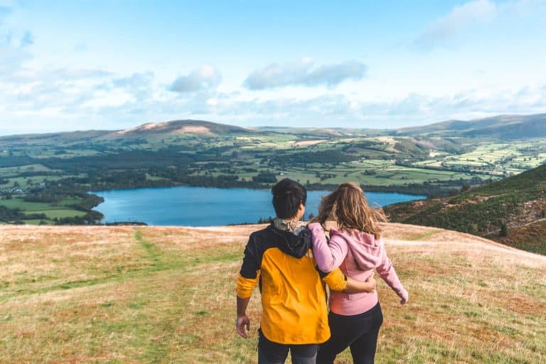 Helen and Andy at the top of Sale Fell overlooking Bassenthwaite Lake, best things to do in the Lake District, UK