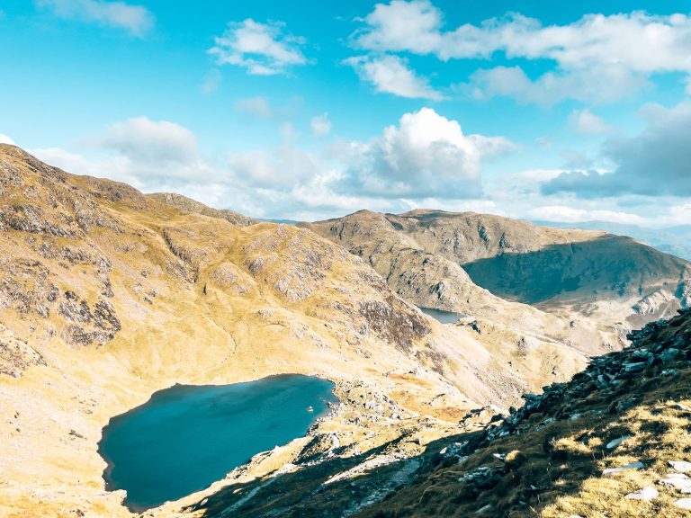 Hiking the Old Man of Coniston is one of the best things to do in the Lake District with an incredible view over Low Water and the surrounding mountains, England