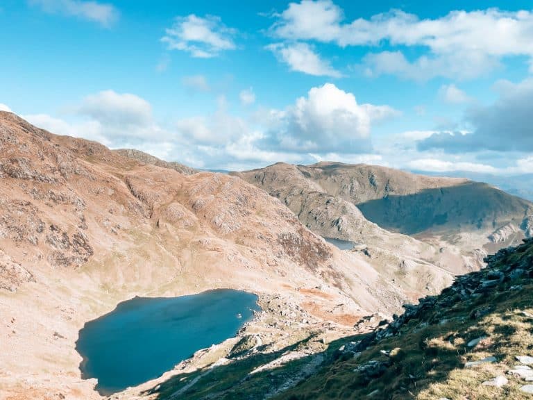 Hiking the Old Man of Coniston is one of the best things to do in the Lake District with an incredible view over Low Water and the surrounding mountains, England