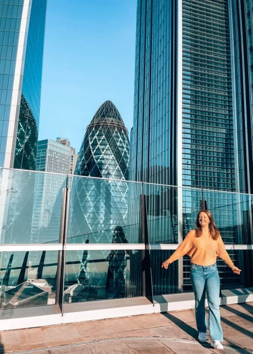 Helen stood in front of the Gherkin at the Garden at 120 roof garden, Fenchurch Street, London, UK