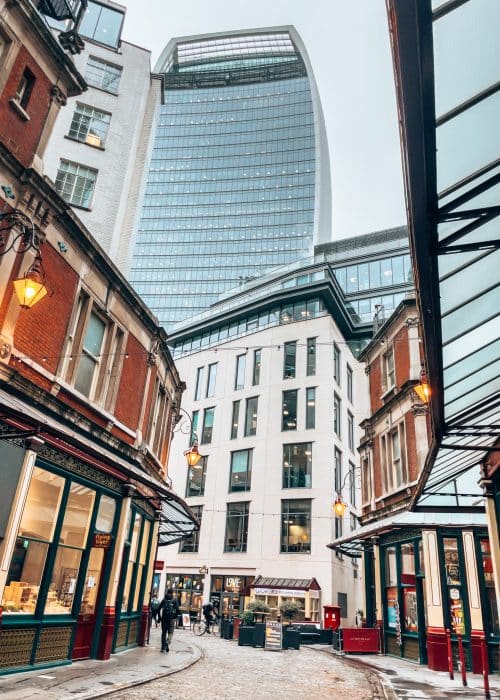 The imposing Walkie Talkie building towering above the stunning Leadenhall Market is a stark contrast, City of London, England, UK