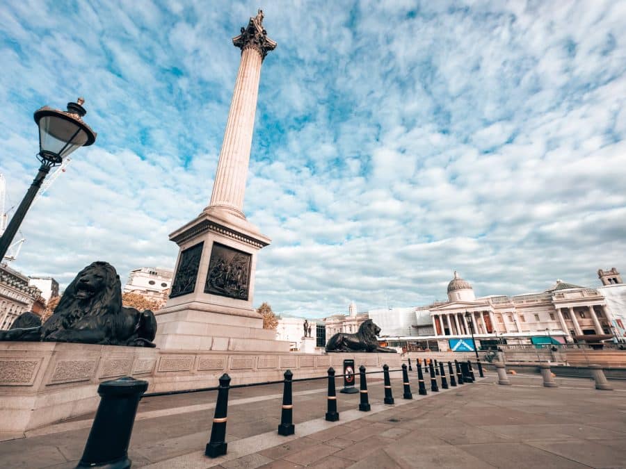 A quiet Trafalgar Square with the 4 lions and Nelson's Column in front of the National Gallery, London