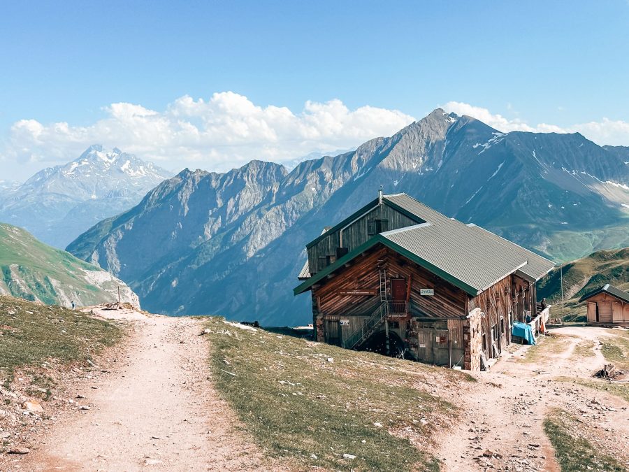 The secluded Refuge du col de la Croix du Bonhomme surrounded by the endless French Alps on the TMB, France