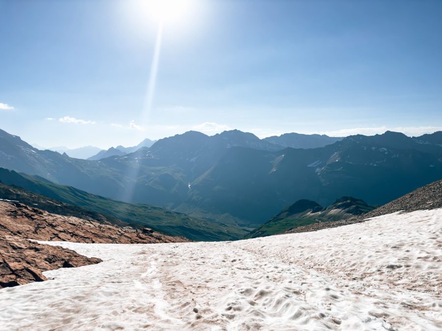 A snowy Col des Fours underneath clear blue sky while hiking the Tour du Mont Blanc, France