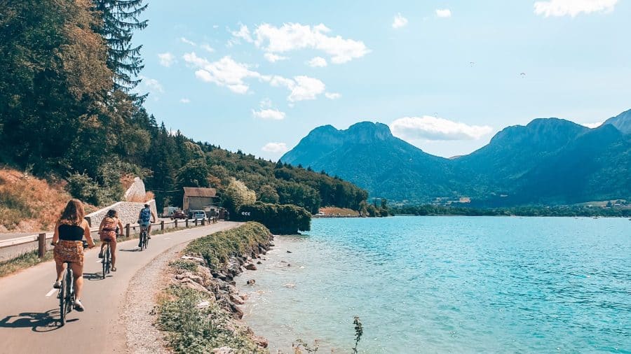 Helen and friends cycling around Lake Annecy with a dramatic mountain backdrop was one of our favourite things to do in Annecy, France