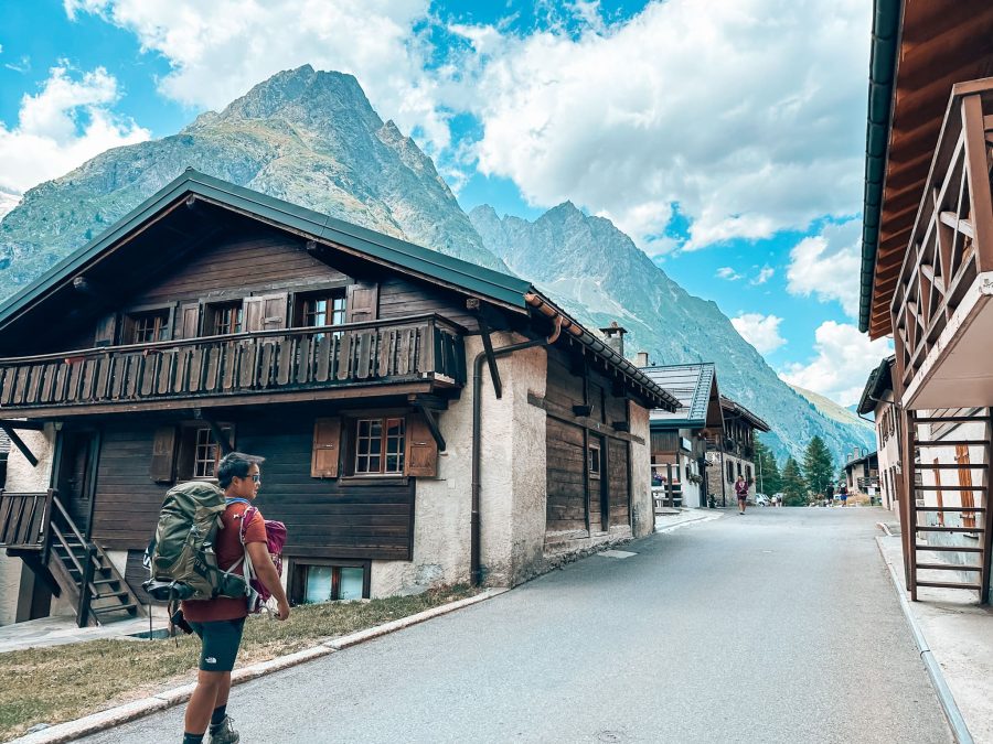 Andy walking through the quaint town of La Fouly on the way to our hotel, Orsières, Tour du Mont Blanc, Switzerland