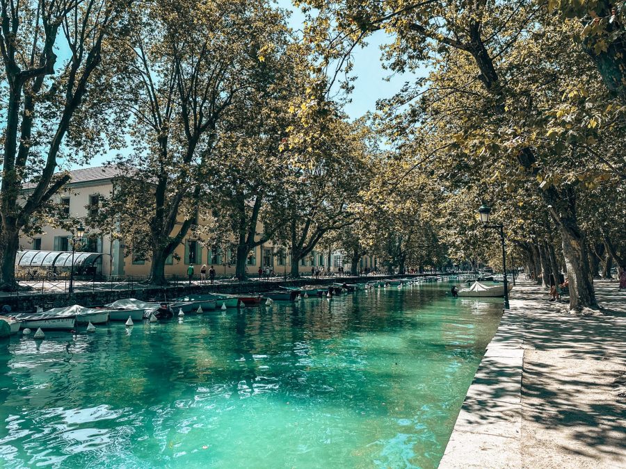 The piercing blue water of Lake Annecy meandering into Le Thiou, things to do in Annecy, France