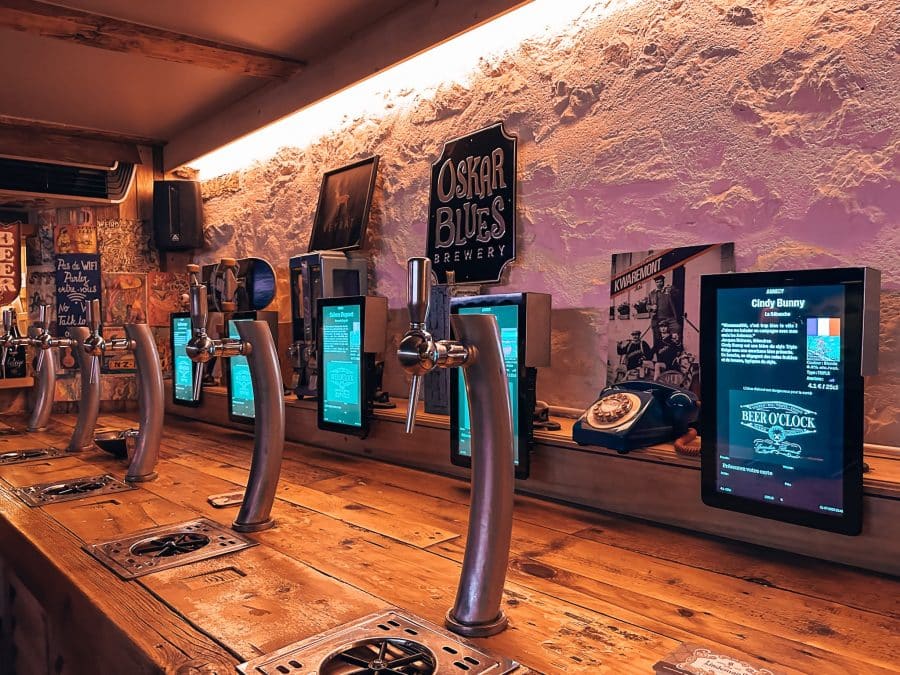 Multiple beer pumps around the room for you to pull beer yourself at Beer O'clock in Annecy Old Town, France