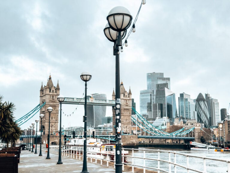 View of Tower Bridge with the City of London behind it from Shad Thames, London weekend trip