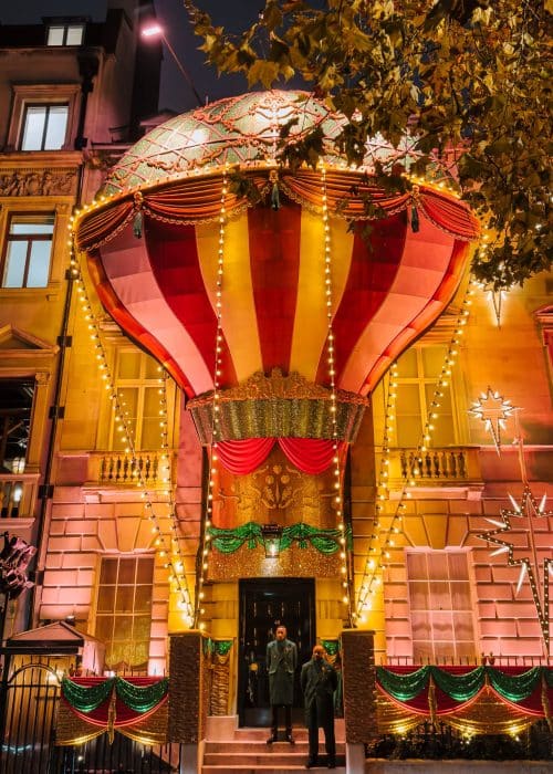 Exterior of Annabel's with a giant hot air balloon across it's three floors, London at Christmas time