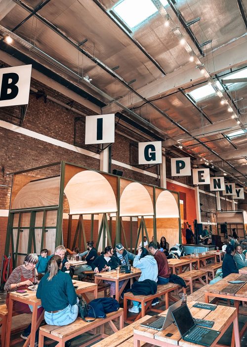 The exposed brick interior of Big Penny Social which is one of the best things to do in Walthamstow, London