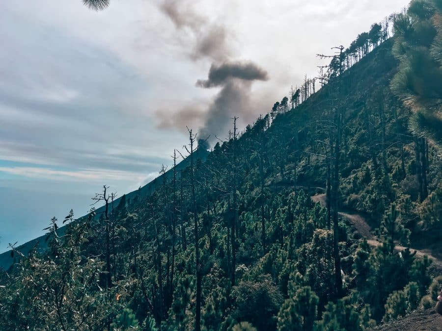 Coming round the side of Acatenango Volcano on volcanic terrain and our first sight of Volcan Fuego, Guatemala