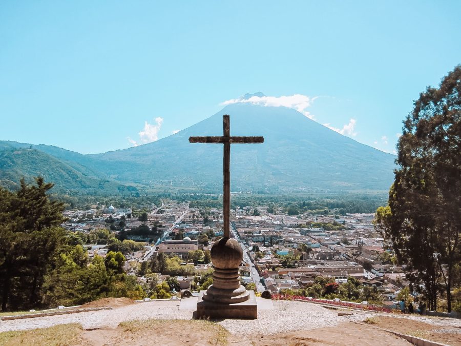 The view from Cerro de la Cruz across Antigua out to Volcan Agua towering above the town, Guatemala