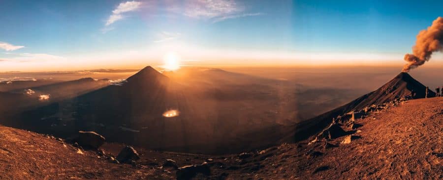 A peaceful sunrise overlooking Volcan Fuego and Volcan Agua and the surrounding landscape, Guatemala