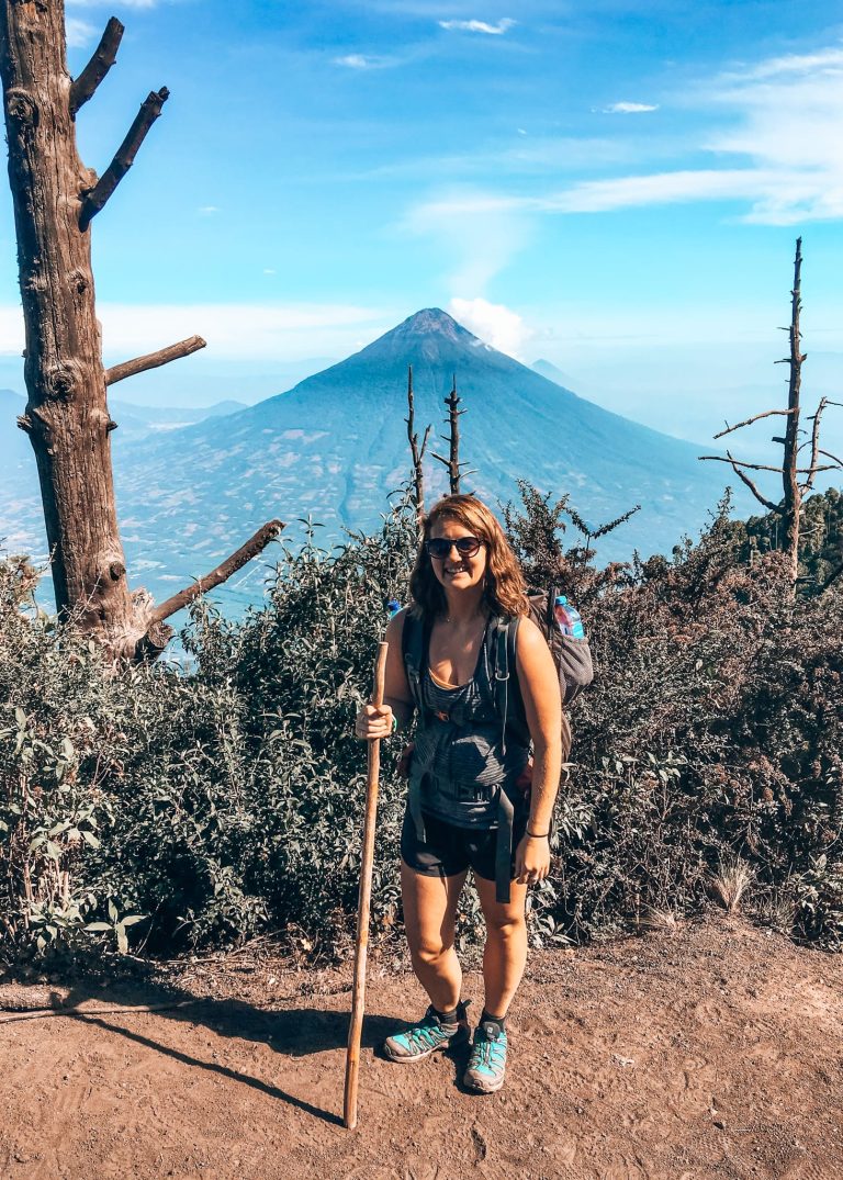 Helen stood with a background of Volcan Agua under the clear blue sky from Volcan Acatenango, Guatemala