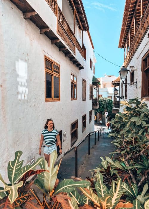 Helen walking up a narrow street in Agaete, one of the best places to visit in Gran Canaria
