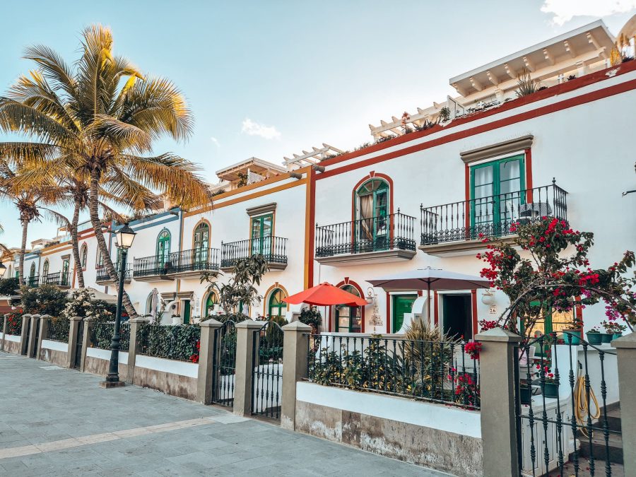 A row of white-washed quaint Mediterranean cottages in Puerto de Mogan, Gran Canaria