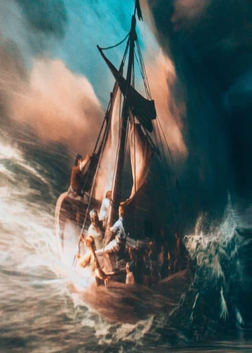 A ship on a stormy sea being pounded by waves in Rembrandt van Rijn's Christ in the Storm on the Lake of Galilee in The World Around Us gallery at Frameless London