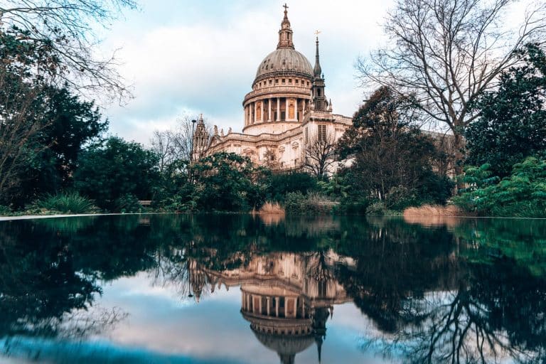 St Paul's dome perfectly reflected in an oval pool, the focal feature of Reflection Garden, one of the best free things to do in London