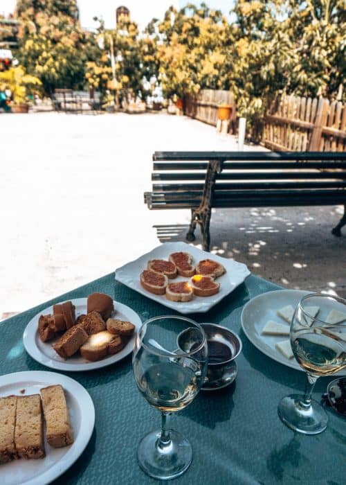A table of local cheese, chorizo, cake, jam and wine at Bodega Los Berrazales Winery, Puerto de las Nieves, Gran Canaria