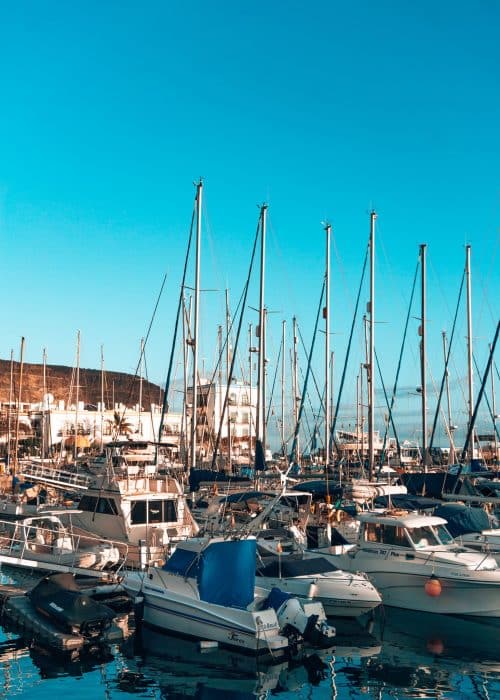 Rows of beautiful yachts in Puerto de Mogan Marina one of the best places to visit in Gran Canaria, Spain