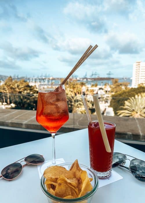 Cocktails and snacks on at Alis Rooftop bar overlooking Las Palmas, Santa Catalina, A Royal Hideaway, Las Palmas de Gran Canaria