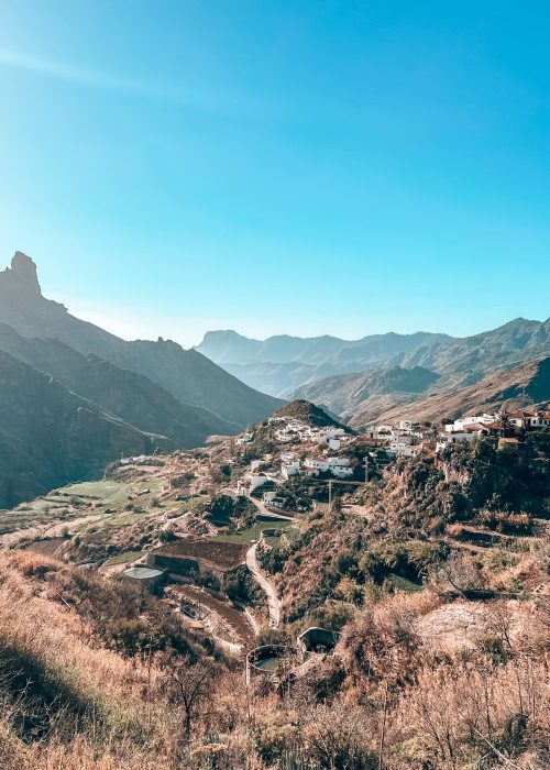 View from the viewpoint in Tejeda over little mountain towns nestled between jagged mountain peaks and rocky outcrops, Gran Canaria, Spain