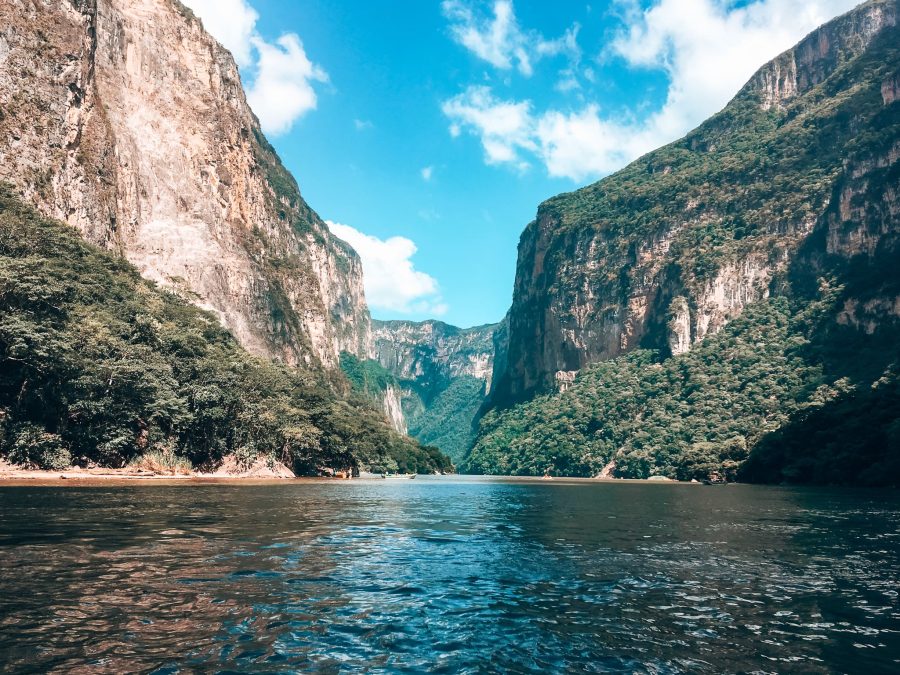 The imposing walls of Canon del Sumidero towering above as we float through the middle, one of the best reasons to visit Mexico