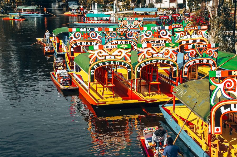 Several colourful trajineras at the Floating Gardens of Xochimilco, one of the best reasons to visit Mexico