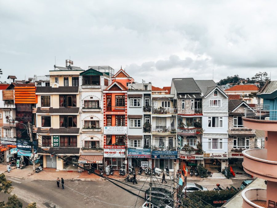 A row of thin colourful tall houses on the street in Dalat, Vietnam