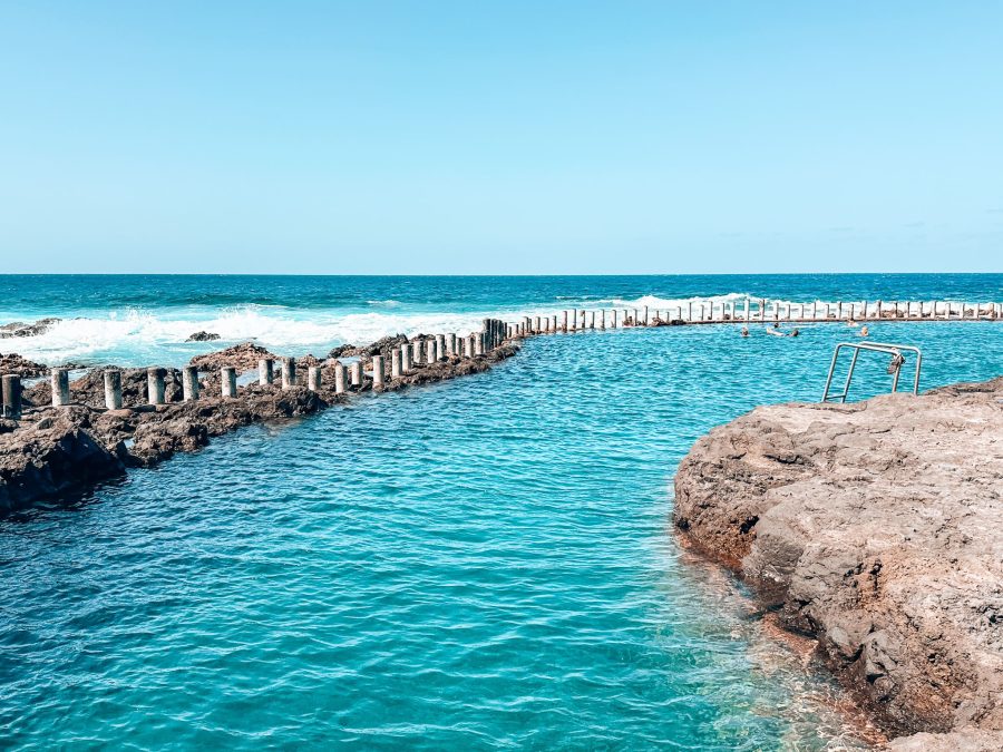 Turquoise ocean water in natural volcanic swimming pools, Las Salinas de Agaete, Puerto de las Nieves, Gran Canaria, Spain