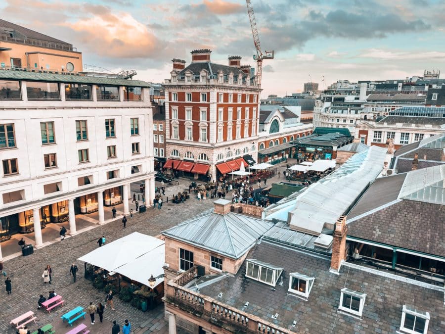 Looking over the bustling Covent Garden and historical buildings from the Royal Opera House rooftop terrace, London