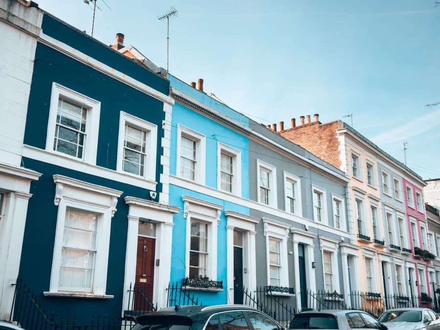 A row of gorgeous colourful houses on Denbigh Terrace, Notting Hill, most beautiful streets in London