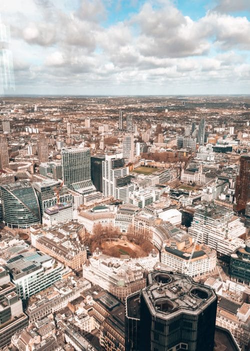 A view through glass windows at Horizon 22, one of the best views of London over Finsbury Circus to Alexandra Palace