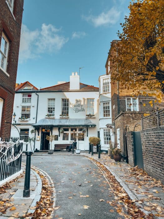 The Holly Bush pub down a narrow road in Hampstead Village in autumn, London