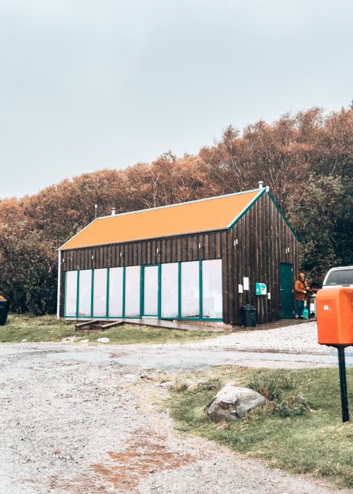 A cafe with a red roof housed an old Post Office next to Lochbuie, Isle of Mull, Scotland