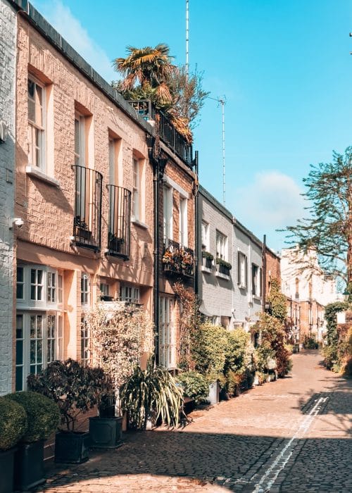 A row of pale yellow terraced houses on Kynance Mews, Prettiest Streets in London