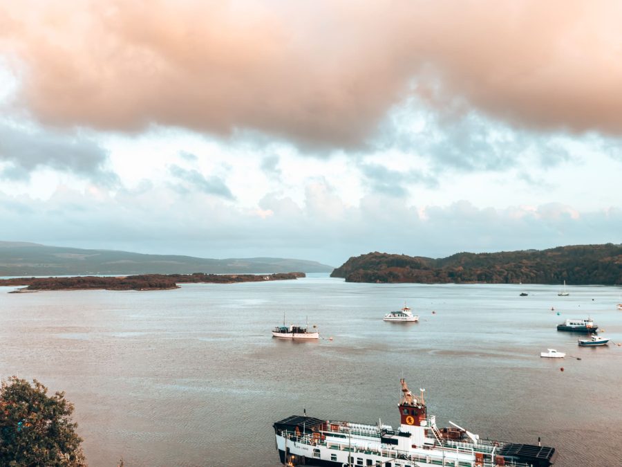 Looking out across the Sound of Mull to Calve Island with lots of boats in the sea, Tobermory, Isle of Mull, Scotland