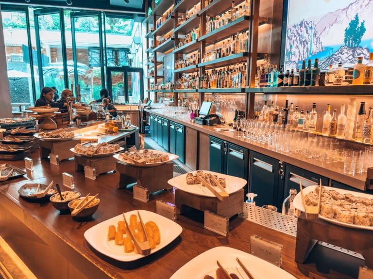 A variety of dishes on the buffet in front of the bar at Nobu Weekend Brunch, best Japanese restaurants in Shoreditch, London