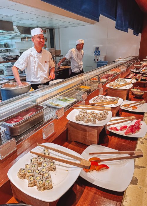 Buffet in front of the open kitchen where the chefs are preparing dishes for the Nobu Weekend Brunch, best Japanese restaurants in Shoreditch, London