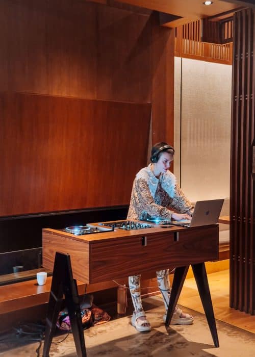 A DJ playing music in the Nobu London Shoreditch Restaurant at the Weekend Brunch