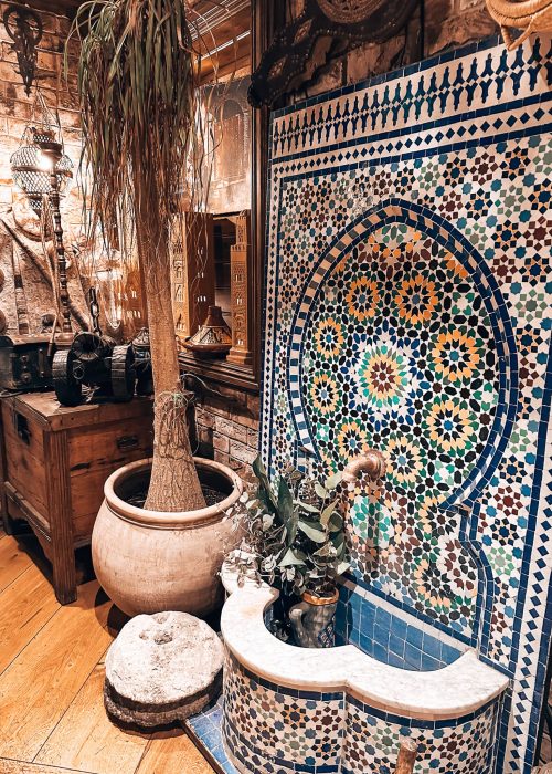 Intricate and colourful mosaic tiles at the entrance to Oasis Lounge London, best Moroccan restaurants in London