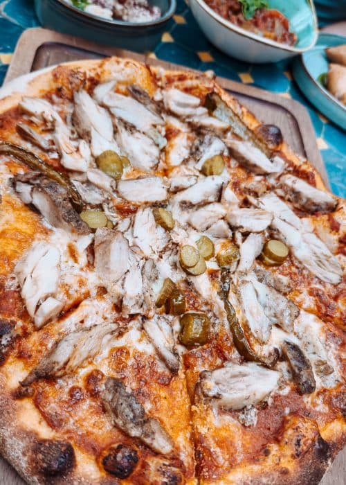 A chicken shawarma Berber-style pizza at Oasis Lounge London, best restaurants in North London