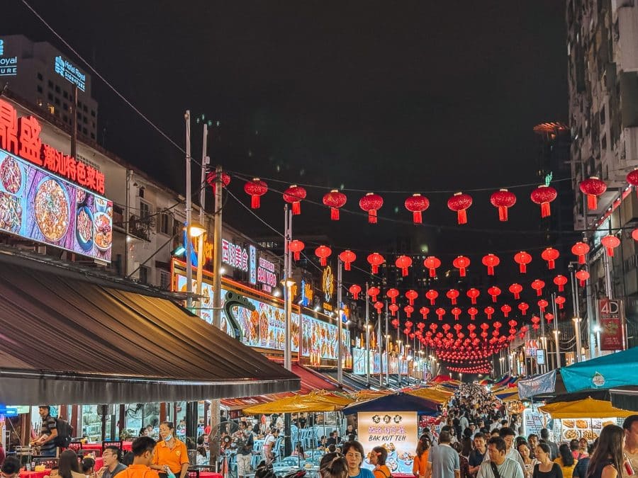 A very busy street filled with street food stalls, restaurants and hundreds of people, Jalan Alor, Things to do in Kuala Lumpur, Malaysia