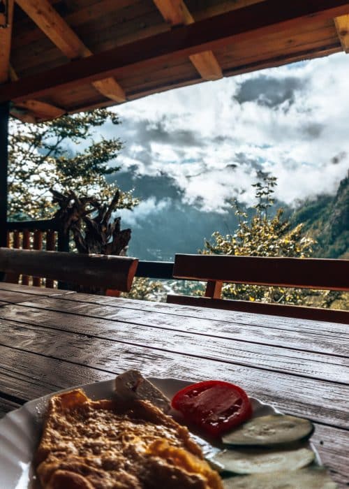 Breakfast on the outside terrace looking over Theth and the surrounding mountains, Thethi Paradise Hotel, Theth, Albania