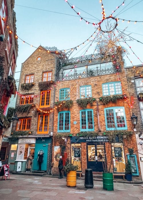 Buildings with bright coloured window frames and doors, Neal's Yard, 4 Day London Itinerary