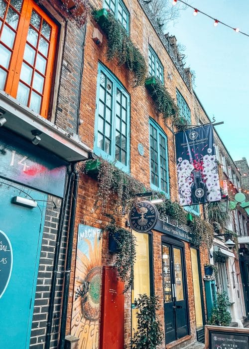 Buildings with bright coloured window frames and doors, Neal's Yard, 4 Day London Itinerary